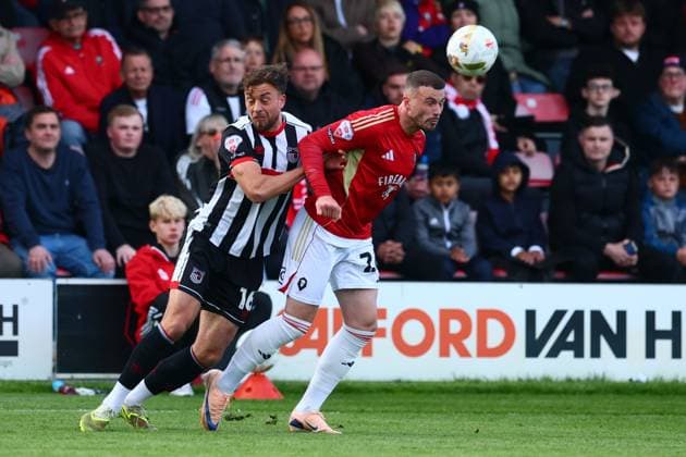Reece Staunton of Grimsby Town and Ryan Graydon of Salford City Salford City v Grimsby Town, EFL Sky Bet League Two, Play-Off Semi Final, Second Leg, Football, Peninsula Stadium, Salford, UK - 15 May 2026Salford Peninsula Stadium United Kingdom EDITORIAL USE ONLY No use with unauthorised audio, video, data, fixture lists, club league logos or live services. Online in-match use limited to 120 images, no video emulation. No use in betting, games or single club league player publications. Copyright: xPaulxCurrie Shutterstockx 16876823bj