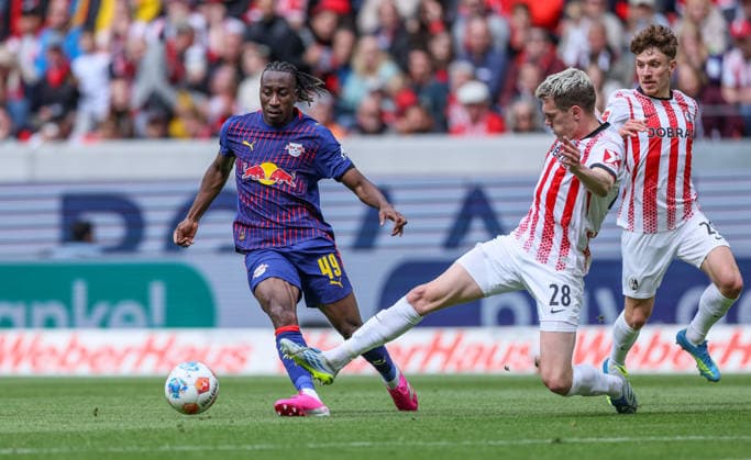 GER, Freiburg, SC Freiburg vs RB Leipzig, Bundesliga, Football, DFB, Season 2025 2026, Europa Park Stadion, 34 Matchday in picture f l Yan Diomande RB Leipzig 49 , Matthias Ginter SC Freiburg 28 DFB DFL REGULATIONS PROHIBIT ANY USE OF PHOTOGRAPHS AS IMAGE SEQUENCES AND OR QUASI VIDEO, 16 05 2026 Copyright: HMBxMedia HendrikxHamelau