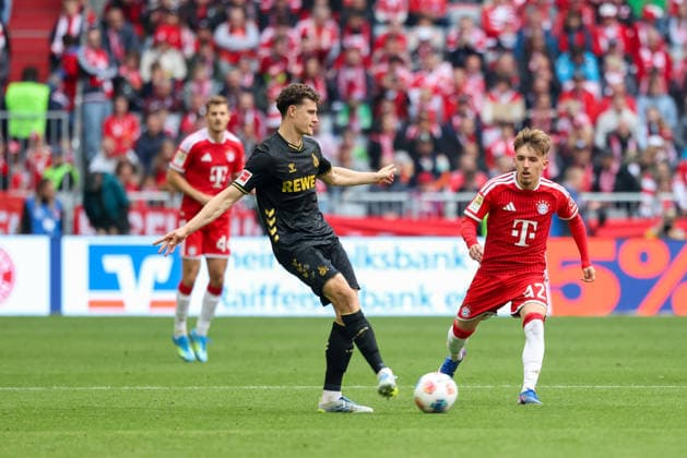 Eric Martel 1 FC Koeln, 06 with Lennart Karl FC Bayern Muenchen, 42 , GER, FC Bayern Muenchen vs 1 FC Koeln, Football, Bundesliga, Matchday 34, Season 2025 2026, 16 05 2026, DFL DFB REGULATIONS PROHIBIT ANY USE OF PHOTOGRAPHS as IMAGE SEQUENCES and or QUASI VIDEO, GER, FC Bayern Muenchen vs 1 FC Koeln, Football, Bundesliga, Matchday 34, Season 2025 2026, 16 05 2026 Muenchen Copyright: xEibner-Pressefoto JennixMaulx EP_JML