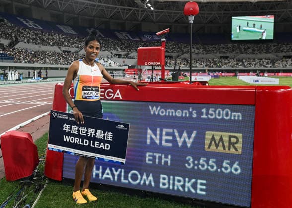 Wanda Diamond League 2026 - Shanghai Keqiao SHAOXING, CHINA - MAY 16: Birke Haylom of Ethiopia poses next to the trackside timing display board celebrating her victory, meeting record, and world-leading time (WL) of 3:55.56 in the women s 1500m final during the Yangtze River Delta Athletics Diamond Gala, the Shanghai Keqiao leg and opening meeting of the 2026 Wanda Diamond League circuit, at the China Textile City Sports Center in Keqiao, Shaoxing, Zhejiang province, China, on May 16, 2026. Artur Widak Anadolu Zhejiang China. Editorial use only. Please get in touch for any other usage. Copyright: x2026xAnadoluxArturxWidakx