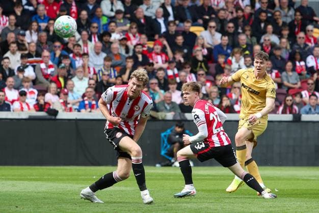 Jorgen Strand Larsen of Crystal Palace takes a shot while under pressure from Nathan Collins and Keane Lewis-Potter of Brentford Brentford v Crystal Palace, Football, Premier League, The Gtech Community Stadium, London, UK - 17 05 2026 EDITORIAL USE ONLY No use with unauthorised audio, video, data, fixture lists, club league logos or live services. Online in-match use limited to 120 images, no video emulation. No use in betting, games or single club league player publications. Copyright: xAnthonyxHanc Shutterstockx 16880122n
