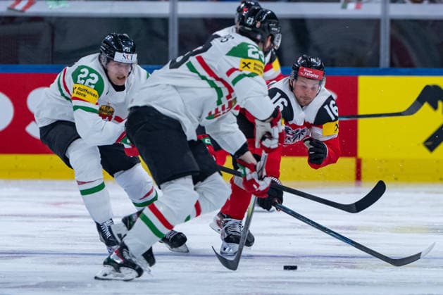 ZURICH, SWITZERLAND - MAY 17: Dominic Zweger (Austria, 16) in the battle for the puck with Zeteny Hadobas (Hungary, 23) and Vilmos Gallo (Hungary, 22) during the Preliminary Round - Group A Match 13 between Austria and Hungary at the IIHF Ice hockey, Eishockey World Championship, WM, Weltmeisterschaft 2026, Swiss Life Arena on May 17, 2026 in Zurich, Switzerland. Zurich Switzerland Copyright: xTimoxSteinx