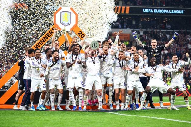 Aston Villa players lift the UEFA Europa League trophy in front of the winners board SC Freiburg v Aston Villa, UEFA Europa League, Final, Football, Besiktas Park, Istanbul, Turkiye - 20 May 2026Istanbul Besiktas Park United Kingdom EDITORIAL USE ONLY No use with unauthorised audio, video, data, fixture lists, club league logos or live services. Online in-match use limited to 120 images, no video emulation. No use in betting, games or single club league player publications. Copyright: xJamesxMarsh Shutterstockx 16883157fl