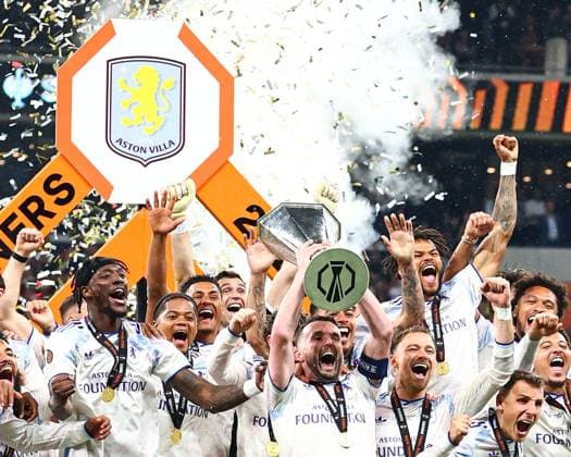 Aston Villa players lift the UEFA Europa League trophy in front of the winners board SC Freiburg v Aston Villa, UEFA Europa League, Final, Football, Besiktas Park, Istanbul, Turkiye - 20 May 2026Istanbul Besiktas Park United Kingdom EDITORIAL USE ONLY No use with unauthorised audio, video, data, fixture lists, club league logos or live services. Online in-match use limited to 120 images, no video emulation. No use in betting, games or single club league player publications. Copyright: xJamesxMarsh Shutterstockx 16883157ga
