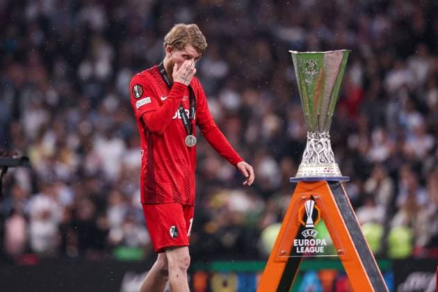 Jan-Niklas Beste of SC Freiburg walks past the Europa League trophy SC Freiburg v Aston Villa, UEFA Europa League, Final, Football, Besiktas Park, Istanbul, Turkiye - 20 May 2026Istanbul Besiktas Park United Kingdom EDITORIAL USE ONLY No use with unauthorised audio, video, data, fixture lists, club league logos or live services. Online in-match use limited to 120 images, no video emulation. No use in betting, games or single club league player publications. Copyright: xRaddadxJebarah Shutterstockx 16883158fi