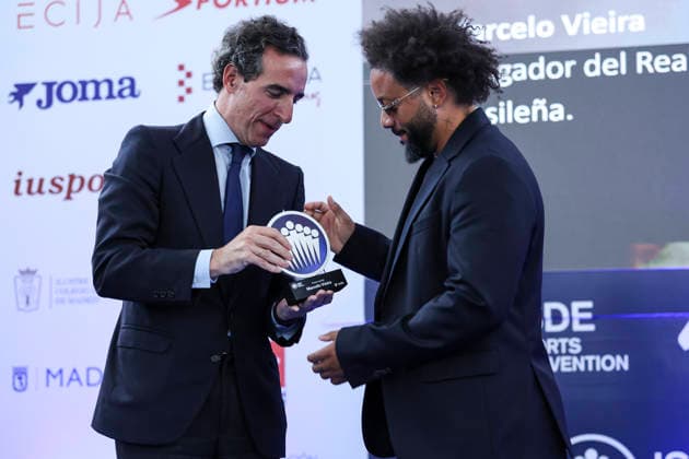May 21, 2026, Madrid, Madrid, Spain: Marcelo Vieira, former soccer player, receives the Legend Award from Juan Jose Sanchez Puig, CEO of ISDE, during the 2026 ISC Awards Ceremony, which took place.as part of the ISDE Sports Convention at the Official College of Architects of Madrid on May 21, 2026, in Madrid, Spain. ISDE Sports Convention - ISC Awards Ceremony - ZUMAa181 20260521_zaa_a181_032 Copyright: xIrinaxR.xHipolitox