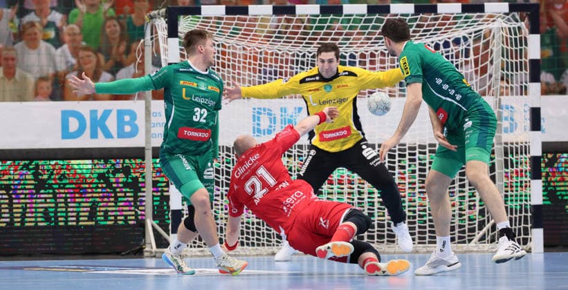 Leipzig, 21 05 2026, Arena Leipzig, Handball, Bundesliga, Matchday 32 , SC DHfK Leipzig vs MT Melsungen , Pictured from left Franz Semper 32, Leipzig , Arnar Freyr Arnarsson 21, Melsungen , Goalkeeper Domenico Ebner 1, Leipzig , Marko Mamic 14, Leipzig , For editorial use only , DHB HBL regulations prohibit any use of photographs as image sequences and or quasi video ,