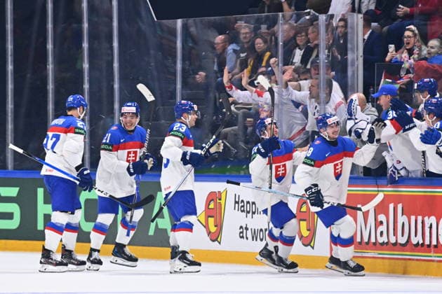L-R hockey players of Slovakia Oliver Okuliar, Adam Liska, Sebastian Cederle, Marek Hrivik celebrate third goal during the 2026 IIHF World Championship, WM, Weltmeisterschaft Group B, match Slovakia vs Denmark, Fribourg, Switzerland, on May 21, 2026. (CTKxPhoto RadekxPetrasek) CTKPhotoP2026052109081 CTKPhotoP2026052109081