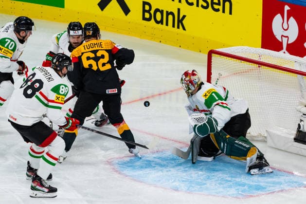 ZURICH, SWITZERLAND - MAY 22: Parker Tuomie (Germany, 62) against Tamas Sarpatki (Hungary, 88), Zsombor Garat (Hungary, 70) and Roland Kiss (Hungary, 17) the Hungarian goal of Bence Balizs (Hungary, 1) during the Preliminary Round - Group A Match 33 between Germany and Hungary at the IIHF Ice hockey, Eishockey World Championship, WM, Weltmeisterschaft 2026, Swiss Life Arena on May 22, 2026 in Zurich, Switzerland. Zurich Switzerland Copyright: xTimoxSteinx