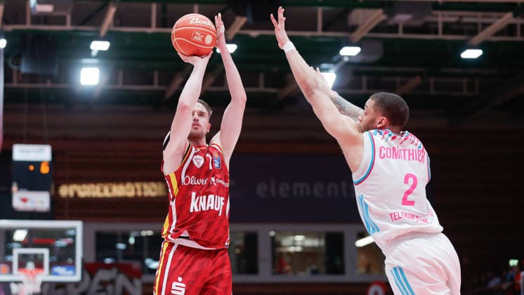 In the picture from left Lukas Herzog Wuerzburg Baskets, 1 on the ball against Alijah Comithier Telekom Baskets Bonn, 2 22 05 2026, Basketball, Fitness First Wuerzburg Baskets vs Telekom Baskets Bonn, easyCredit BBL Playoffs, 3 Quarterfinals, Germany, 97072, tectake Arena Wuerzburg, Copyright: HMBxMedia xJulienxBecker