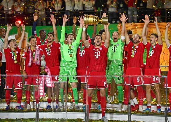 23 05 2026, Football DFB Cup 2025 2026, Final, FC Bayern Munich VfB Stuttgart, at the Olympiastadion Berlin from left coach Vincent Kompany FC Bayern Munich , Lennart Karl FC Bayern Munich , Tom Bischof Bayern Munich , Aleksandar Pavlovic Bayern Munich , Goalkeeper Jonas Urbig FC Bayern Munich , Leon Goretzka FC Bayern Munich , Goalkeeper Manuel Neuer FC Bayern Munich , Harry Kane FC Bayern Munich , and Josip Stanisic Bayern Munich DFL and DFB regulations prohibit any use of photographs as image sequences and or quasi video