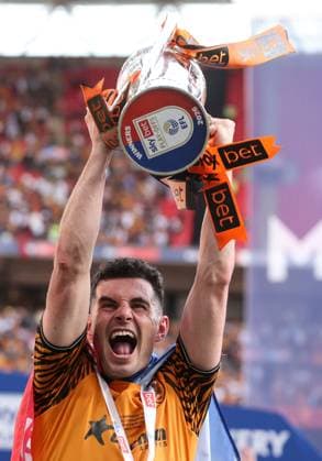 John Egan of Hull City lifts the Championship play off trophy Hull City v Middlesbrough, EFL Sky Bet Championship, Play-Off Final, Football, Wembley Stadium, London, UK - 23 May 2026London Wembley Stadium United Kingdom EDITORIAL USE ONLY No use with unauthorised audio, video, data, fixture lists, club league logos or live services. Online in-match use limited to 120 images, no video emulation. No use in betting, games or single club league player publications. Copyright: xKieranxMcManus Shutterstockx 16887313lh