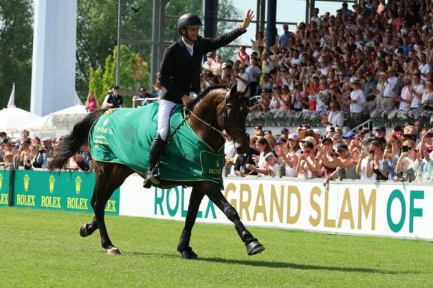 Winner, 1 place, Richard Vogel GER with horse United Touch S, Rolex Grand Slam of Show Jumping, prize-giving ceremony, lap of honor, high-five with the fans Jumping competition with two rounds and jump-off, World Equestrian Festival, World Equestrian Festival, TSCHIO Aachen 2026, TSCHIO instead of CHIO 2026, Aachener Soers, May 22 to 24, 2026, equestrian sport, May 24, 2026, Aachener Soers Germany