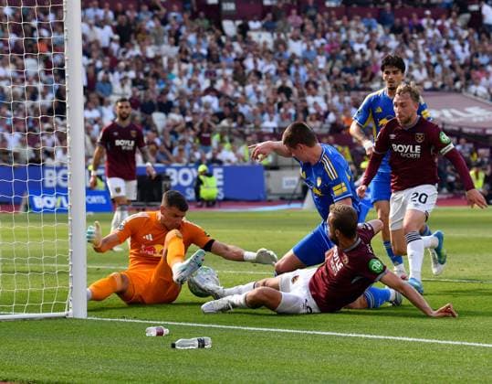 Karl Darlow of Leeds United saves under pressure from Tomas Soucek of West Ham United West Ham United v Leeds United, Premier League, Football, London Stadium, London, UK - 24 May 2026London London Stadium United Kingdom EDITORIAL USE ONLY No use with unauthorised audio, video, data, fixture lists, club league logos or live services. Online in-match use limited to 120 images, no video emulation. No use in betting, games or single club league player publications. Copyright: xAlanxWalter Shutterstockx 16889881v
