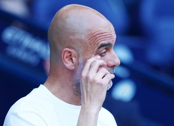 An emotional looking Manchester City manager Pep Guardiola wipes their eye at the end of the match Manchester City v Aston Villa, Premier League, Football, Etihad Stadium, Manchester, UK - 24 May 2026Manchester Etihad Stadium United Kingdom EDITORIAL USE ONLY No use with unauthorised audio, video, data, fixture lists, club league logos or live services. Online in-match use limited to 120 images, no video emulation. No use in betting, games or single club league player publications. Copyright: xMattxWest Shutterstockx 16889851an