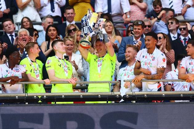 Jack Bonham of Bolton Wanderers lifts the Sky Bet League One Play Off Trophy Bolton Wanderers v Stockport County, EFL Sky Bet League One, Play-Off Final, Football, Wembley Stadium, London, UK - 24 May 2026London Wembley Stadium United Kingdom EDITORIAL USE ONLY No use with unauthorised audio, video, data, fixture lists, club league logos or live services. Online in-match use limited to 120 images, no video emulation. No use in betting, games or single club league player publications. Copyright: xPaulxCurrie Shutterstockx 16889803hd