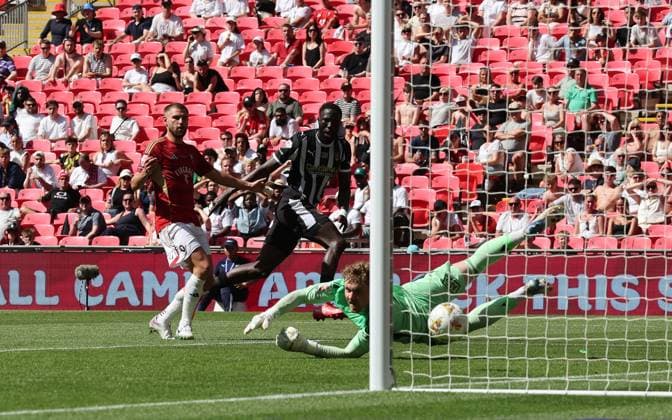 Alassana Jatta of Notts County scores the opening goal 1-0 past Goalkeeper Matthew Young of Salford City Notts County v Salford City, EFL Sky Bet League Two, Play-Off Final, Football, Wembley Stadium, London, UK - 25 May 2026London Wembley Stadium United Kingdom EDITORIAL USE ONLY No use with unauthorised audio, video, data, fixture lists, club league logos or live services. Online in-match use limited to 120 images, no video emulation. No use in betting, games or single club league player publications. Copyright: xAndrewxFosker Shutterstockx 16889937be