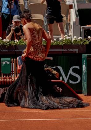 Naomi Osaka of Japan wears a gold sequinned dress under a black sequinned long skirt and corset French Open Tennis, Day Three, Tennis, Roland Garros, Paris, France - 26 May 2026Paris Roland Garros France EDITORIAL USE ONLY No use with unauthorised audio, video, data, fixture lists, club league logos or live services. Online in-match use limited to 120 images, no video emulation. No use in betting, games or single club league player publications. Copyright: xEllaxLing Shutterstockx 16898259q