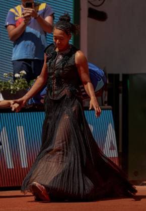 Naomi Osaka of Japan wears a gold sequinned dress under a black sequinned long skirt and corset French Open Tennis, Day Three, Tennis, Roland Garros, Paris, France - 26 May 2026Paris Roland Garros France EDITORIAL USE ONLY No use with unauthorised audio, video, data, fixture lists, club league logos or live services. Online in-match use limited to 120 images, no video emulation. No use in betting, games or single club league player publications. Copyright: xEllaxLing Shutterstockx 16898259i
