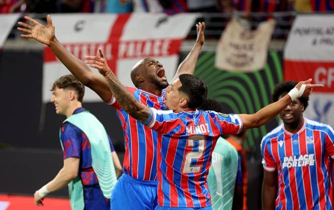 Jean-Philippe Mateta of Crystal Palace (left) celebrates with teammate Daniel Munoz after scoring their side s first goal of the game Crystal Palace v Rayo Vallecano, UEFA Conference League, Final, Football, Red Bull Arena, Leipzig, Germany - 27 May 2026Leipzig Red Bull Arena Germany EDITORIAL USE ONLY No use with unauthorised audio, video, data, fixture lists, club league logos or live services. Online in-match use limited to 120 images, no video emulation. No use in betting, games or single club league player publications. Copyright: xKieranxMcManus Shutterstockx 16898266ck