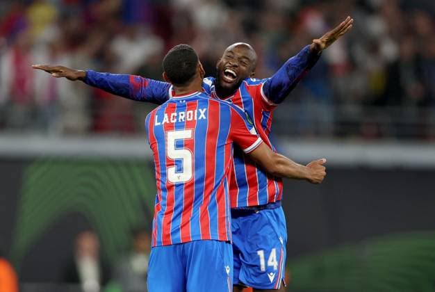 Jean-Philippe Mateta of Crystal Palace (right) celebrates with teammate Maxence Lacroix winning the UEFA Conference League Crystal Palace v Rayo Vallecano, UEFA Conference League, Final, Football, Red Bull Arena, Leipzig, Germany - 27 May 2026Leipzig Red Bull Arena Germany EDITORIAL USE ONLY No use with unauthorised audio, video, data, fixture lists, club league logos or live services. Online in-match use limited to 120 images, no video emulation. No use in betting, games or single club league player publications. Copyright: xKieranxMcManus Shutterstockx 16898266di