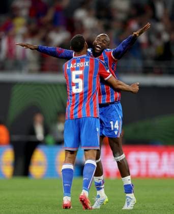 Jean-Philippe Mateta of Crystal Palace (right) celebrates with teammate Maxence Lacroix winning the UEFA Conference League Crystal Palace v Rayo Vallecano, UEFA Conference League, Final, Football, Red Bull Arena, Leipzig, Germany - 27 May 2026Leipzig Red Bull Arena Germany EDITORIAL USE ONLY No use with unauthorised audio, video, data, fixture lists, club league logos or live services. Online in-match use limited to 120 images, no video emulation. No use in betting, games or single club league player publications. Copyright: xKieranxMcManus Shutterstockx 16898266dj