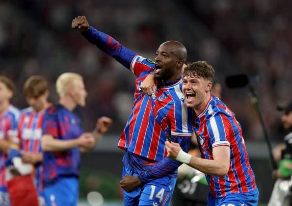 Jean-Philippe Mateta of Crystal Palace celebrates with teammate Jörgen Strand Larsen (right) winning the UEFA Conference League Crystal Palace v Rayo Vallecano, UEFA Conference League, Final, Football, Red Bull Arena, Leipzig, Germany - 27 May 2026Leipzig Red Bull Arena Germany EDITORIAL USE ONLY No use with unauthorised audio, video, data, fixture lists, club league logos or live services. Online in-match use limited to 120 images, no video emulation. No use in betting, games or single club league player publications. Copyright: xKieranxMcManus Shutterstockx 16898266dl