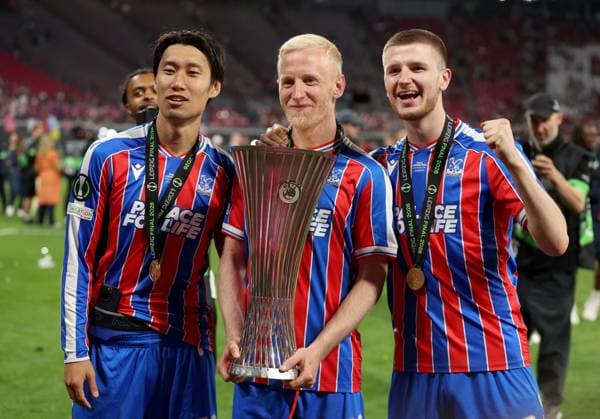 (Left to right) Daichi Kamada, Will Hughes and Adam Wharton of Crystal Palace celebrate with the trophy after winning the UEFA Conference League Crystal Palace v Rayo Vallecano, UEFA Conference League, Final, Football, Red Bull Arena, Leipzig, Germany - 27 May 2026Leipzig Red Bull Arena Germany EDITORIAL USE ONLY No use with unauthorised audio, video, data, fixture lists, club league logos or live services. Online in-match use limited to 120 images, no video emulation. No use in betting, games or single club league player publications. Copyright: xKieranxMcManus Shutterstockx 16898266fd