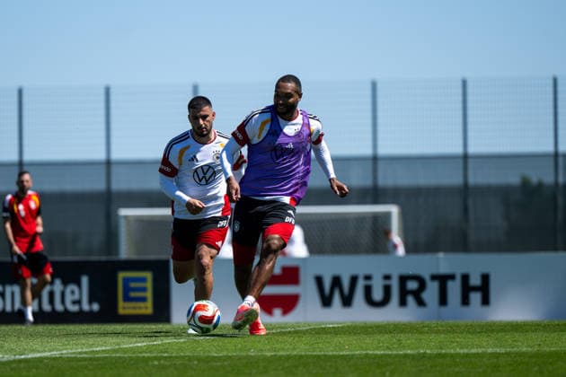 GER, Football mens national team Germany, training, 28 05 2026, Adidas Homeground, Herzogenaurach, GER, Football mens national team Germany, training, in the picture Jonathan Tah Germany, 04 on the ball in front of Deniz Undav Germany, 26 , nordphotoxGmbHx xMemmler nph00005