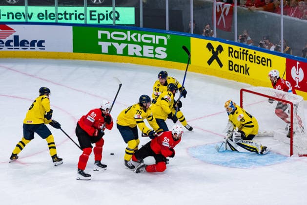 ZURICH, SWITZERLAND - MAY 28: Oskar Sundqvist (Sweden, 70) pushing down Roman Josi (Switzerland, 90) in front of the goal of Magnus Hellberg (Sweden, 45) during the Quarter Finals - Match 59 between Switzerland and Sweden at the IIHF Ice hockey, Eishockey World Championship, WM, Weltmeisterschaft 2026, Swiss Life Arena on May 28, 2026 in Zurich, Switzerland. Zurich Switzerland Copyright: xTimoxSteinx