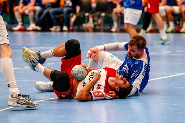 Yonatan Dayan HBW Balingen Weilstetten, 34 goes down after duel, duel, fight with Valentin Neagu Dessau Rosslauer HV 06, 13 , Dessau Rosslauer HV 06 vs HBW Balingen Weilstetten, Handball, 2 Bundesliga, 33 Matchday, Season 2025 26, 29 05 2026, Dessau Rosslauer HV 06 vs HBW Balingen Weilstetten, Handball, 2 Bundesliga, 33 Matchday, Season 2025 26, 29 05 2026 Dessau Rosslau Copyright: xEibner-Pressefoto LauraxRoemerx EP_LRR