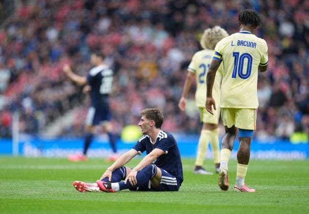 Billy Gilmour of Scotland injured on the pitch with suspected right knee injury before being substituted for Findlay Curtis of Scotland. Scotland v Curacao, International Friendly, Länderspiel, Nationalmannschaft Football, Hampden Park, Glasgow, Scotland, UK - 30 May 2026Glasgow Hampden Park United Kingdom EDITORIAL USE ONLY No use with unauthorised audio, video, data, fixture lists, club league logos or live services. Online in-match use limited to 120 images, no video emulation. No use in betting, games or single club league player publications. Copyright: xStuartxWallace Shutterstockx 16898283am