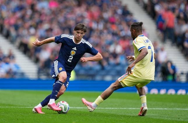 Aaron Hickey of Scotland & Juninho Bacuna of Curacao Scotland v Curacao, International Friendly, Länderspiel, Nationalmannschaft Football, Hampden Park, Glasgow, Scotland, UK - 30 May 2026Glasgow Hampden Park United Kingdom EDITORIAL USE ONLY No use with unauthorised audio, video, data, fixture lists, club league logos or live services. Online in-match use limited to 120 images, no video emulation. No use in betting, games or single club league player publications. Copyright: xStuartxWallace Shutterstockx 16898283ap