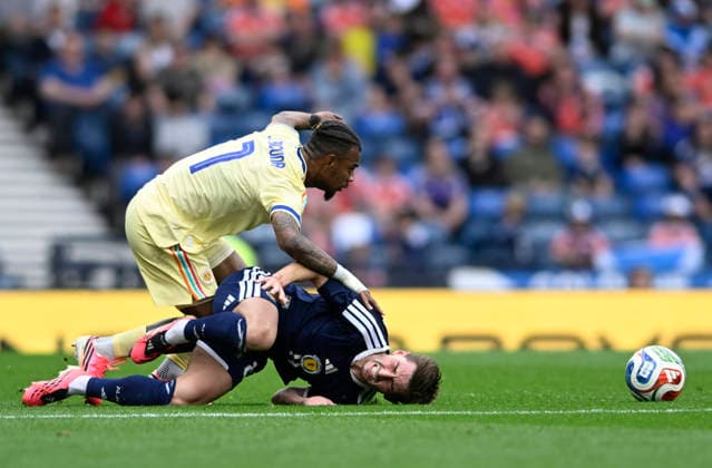 Glasgow, Scotland, 30th May 2026. Juninho Bacuna of Curacao and Billy Gilmour of Scotland during the Scotland vs Curacao International Friendly, Länderspiel, Nationalmannschaft match at Hampden Park, Glasgow. Picture credit should read: Neil Hanna Sportimage EDITORIAL USE ONLY. No use with unauthorised audio, video, data, fixture lists, club league logos or live services. Online in-match use limited to 120 images, no video emulation. No use in betting, games or single club league player publications. SPI_084_NH_Scotland_Curacao SPI-4830-0084
