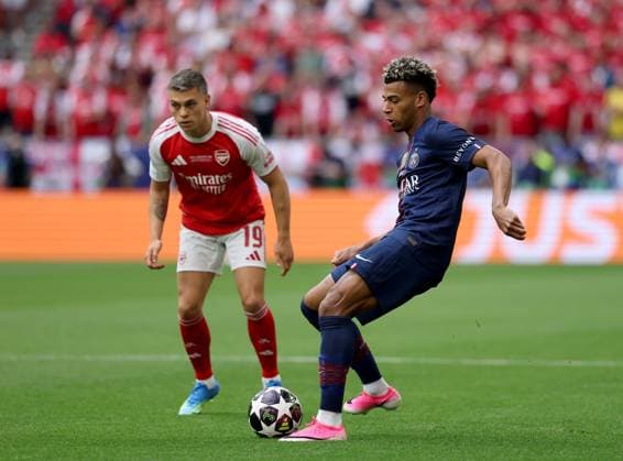 Desire Doue of Paris Saint-Germain in action against Leandro Trossard of Arsenal Paris Saint-Germain v Arsenal, UEFA Champions League, Final, Football, Puskas Arena, Budapest, Hungary - 30 May 2026Budapest Puskas Arena Hungary EDITORIAL USE ONLY No use with unauthorised audio, video, data, fixture lists, club league logos or live services. Online in-match use limited to 120 images, no video emulation. No use in betting, games or single club league player publications. Copyright: xAhmadxMora Shutterstockx 16902827an