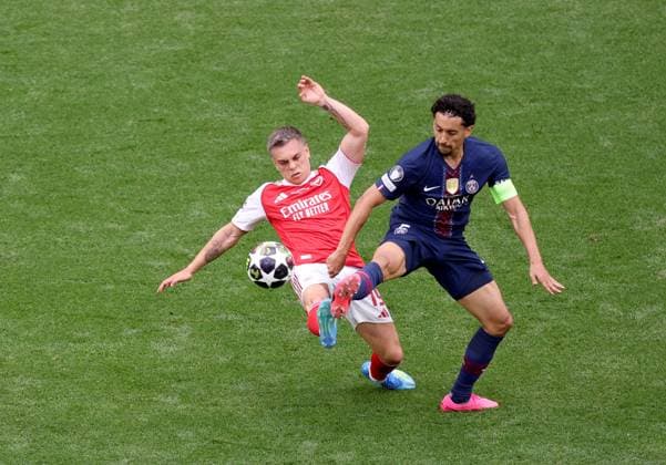 Leandro Trossard of Arsenal in action against Marquinhos of Paris Saint-Germain Paris Saint-Germain v Arsenal, UEFA Champions League, Final, Football, Puskas Arena, Budapest, Hungary - 30 May 2026Budapest Puskas Arena Hungary EDITORIAL USE ONLY No use with unauthorised audio, video, data, fixture lists, club league logos or live services. Online in-match use limited to 120 images, no video emulation. No use in betting, games or single club league player publications. Copyright: xGabriellaxBarbara Shutterstockx 16902828o