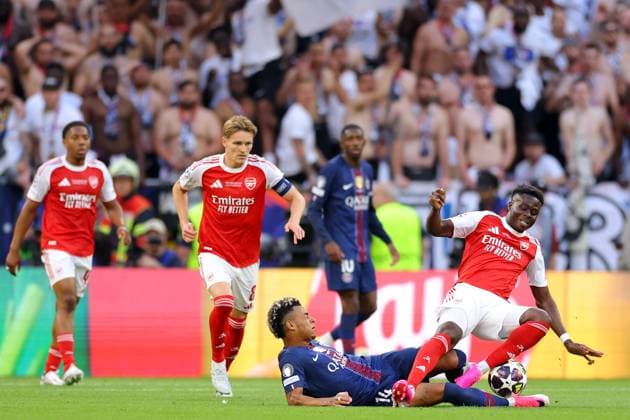 Bukayo Saka of Arsenal fouls Desire Doue of Paris Saint-Germain - PSG v Arsenal, UEFA Champions League Final, Puskas Arena, Budapest, Hungary. - 30th May 2026. No free usage or syndication, standard fees apply. Paris Saint-Germain v Arsenal, UEFA Champions League, Final, Football, Puskas Arena, Budapest, Hungary - 30 May 2026Budapest Puskas Arena Hungary EDITORIAL USE ONLY No use with unauthorised audio, video, data, fixture lists, club league logos or live services. Online in-match use limited to 120 images, no video emulation. No use in betting, games or single club league player publications. Copyright: xMDI Shutterstockx 16904246at