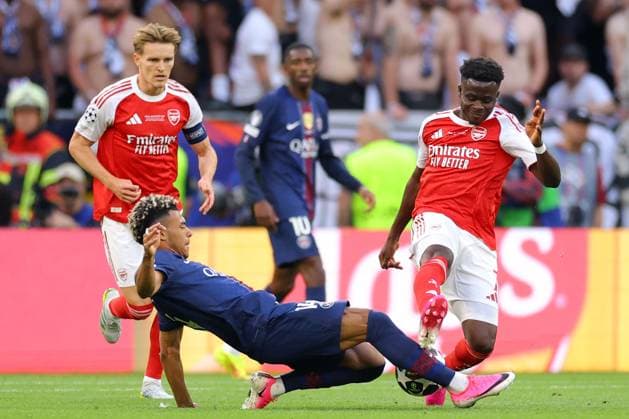 Bukayo Saka of Arsenal fouls Desire Doue of Paris Saint-Germain - PSG v Arsenal, UEFA Champions League Final, Puskas Arena, Budapest, Hungary. - 30th May 2026. No free usage or syndication, standard fees apply. Paris Saint-Germain v Arsenal, UEFA Champions League, Final, Football, Puskas Arena, Budapest, Hungary - 30 May 2026Budapest Puskas Arena Hungary EDITORIAL USE ONLY No use with unauthorised audio, video, data, fixture lists, club league logos or live services. Online in-match use limited to 120 images, no video emulation. No use in betting, games or single club league player publications. Copyright: xMDI Shutterstockx 16904246au