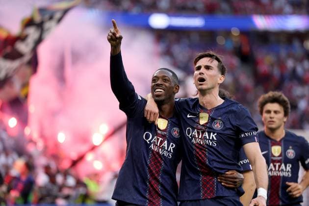 Ousmane Dembele of Paris Saint-Germain (left) celebrates with teammate Fabian Ruiz scoring their side s first goal of the game Paris Saint-Germain v Arsenal, UEFA Champions League, Final, Football, Puskas Arena, Budapest, Hungary - 30 May 2026Budapest Puskas Arena Hungary EDITORIAL USE ONLY No use with unauthorised audio, video, data, fixture lists, club league logos or live services. Online in-match use limited to 120 images, no video emulation. No use in betting, games or single club league player publications. Copyright: xAhmadxMora Shutterstockx 16902827bz