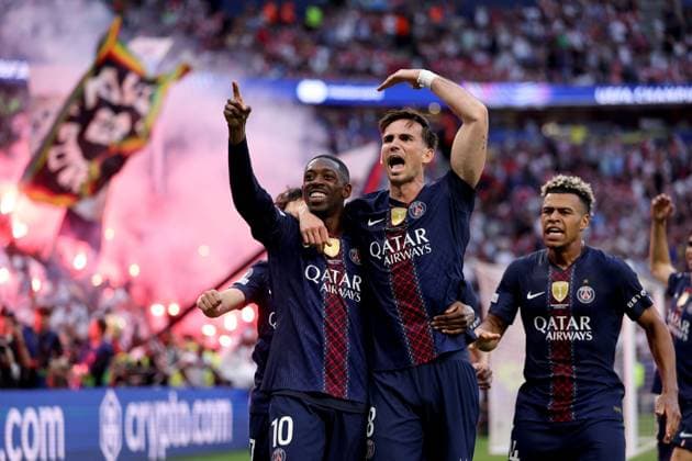 Ousmane Dembele of Paris Saint-Germain (left) celebrates with teammate Fabian Ruiz scoring their side s first goal of the game Paris Saint-Germain v Arsenal, UEFA Champions League, Final, Football, Puskas Arena, Budapest, Hungary - 30 May 2026Budapest Puskas Arena Hungary EDITORIAL USE ONLY No use with unauthorised audio, video, data, fixture lists, club league logos or live services. Online in-match use limited to 120 images, no video emulation. No use in betting, games or single club league player publications. Copyright: xAhmadxMora Shutterstockx 16902827cb