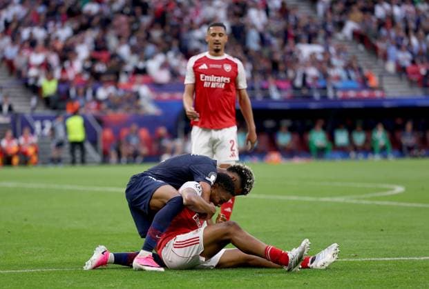 Myles Lewis-Skelly of Arsenal hugs Desire Doue of Paris Saint-Germain Paris Saint-Germain v Arsenal, UEFA Champions League, Final, Football, Puskas Arena, Budapest, Hungary - 30 May 2026Budapest Puskas Arena Hungary EDITORIAL USE ONLY No use with unauthorised audio, video, data, fixture lists, club league logos or live services. Online in-match use limited to 120 images, no video emulation. No use in betting, games or single club league player publications. Copyright: xAhmadxMora Shutterstockx 16902827dh