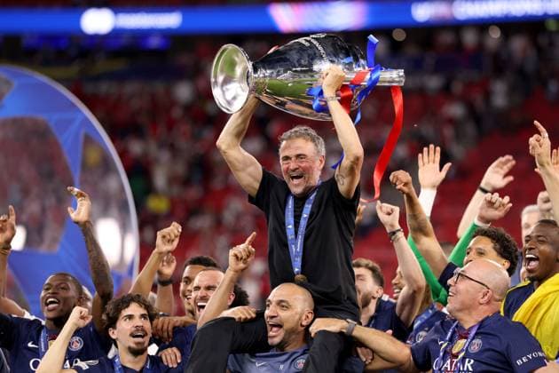 Luis Enrique head coach of Paris Saint-Germain celebrates with the trophy after winning the UEFA Champions League Paris Saint-Germain v Arsenal, UEFA Champions League, Final, Football, Puskas Arena, Budapest, Hungary - 30 May 2026Budapest Puskas Arena Hungary EDITORIAL USE ONLY No use with unauthorised audio, video, data, fixture lists, club league logos or live services. Online in-match use limited to 120 images, no video emulation. No use in betting, games or single club league player publications. Copyright: xAhmadxMora Shutterstockx 16902827ex