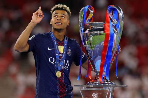 Desire Doue of Paris Saint-Germain with the Champions League Trophy - PSG v Arsenal, UEFA Champions League Final, Puskas Arena, Budapest, Hungary. - 30th May 2026. No free usage or syndication, standard fees apply. Paris Saint-Germain v Arsenal, UEFA Champions League, Final, Football, Puskas Arena, Budapest, Hungary - 30 May 2026Budapest Puskas Arena Hungary EDITORIAL USE ONLY No use with unauthorised audio, video, data, fixture lists, club league logos or live services. Online in-match use limited to 120 images, no video emulation. No use in betting, games or single club league player publications. Copyright: xMDI Shutterstockx 16904246dp
