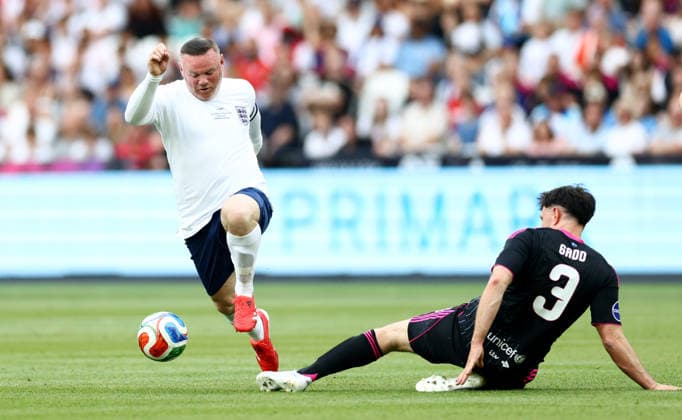 Wayne Rooney of England and Richard Gadd of World XI. England XI v World XI, Soccer Aid for Unicef 2026, Football, London Stadium, London, UK - 31 May 2026London London Stadium United Kingdom EDITORIAL USE ONLY No use with unauthorised audio, video, data, fixture lists, club league logos or live services. Online in-match use limited to 120 images, no video emulation. No use in betting, games or single club league player publications. Copyright: xJamesxMarsh Shutterstockx 16898311at