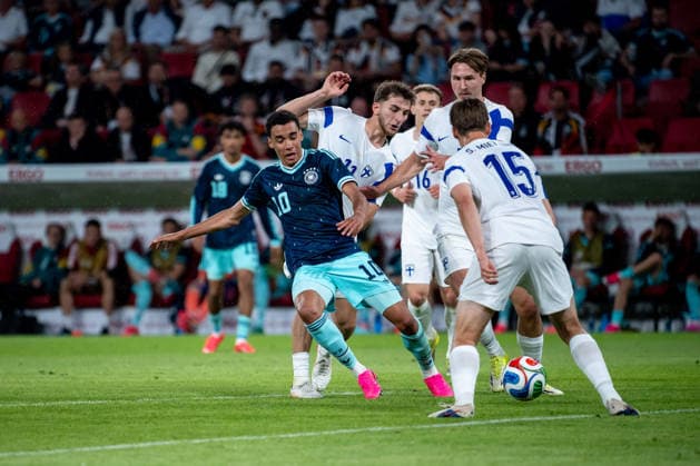 GER, Germany vs. Finland, international match, World Cup preparation 2026 31 05 2026, Mewa Arena, Mainz, GER, Germany vs. Finland, international match, World Cup preparation 2026, in the picture Jamal Musiala Germany, 10 in duel with Adam Marhiev Finland, 11 , Samuli Miettinen Finland, 15 , nordphotoxGmbHx xMemmler nph00005