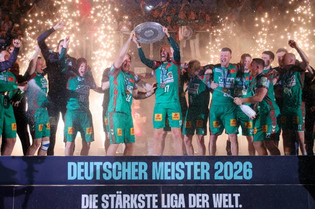 03 06 2026, xtgx, Handball, Daikin HBL, SC Magdeburg VfL Gummersbach v l award ceremony around Christian O Sullivan Magdeburg, 24 and Tim Hornke Magdeburg, 17 , championship bowl, bowl, trophy jubilation over title win, championship, German champion, jubilates, celebration Magdeburg