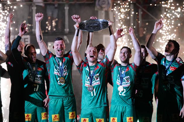 Daniel Pettersson SC Magdeburg,11 with the championship trophy and from left Tim Hornke SC Magdeburg,17 , Philipp Weber SC Magdeburg,20 , Lukas Mertens SC Magdeburg,22 , Manuel Zehnder SC Magdeburg,8 Handball Bundesliga season 2025 2026 SC Magdeburg vs VfL Gummersbach in the GETEC Arena in Magdeburg Action,Handball,Germany,03 06 2026