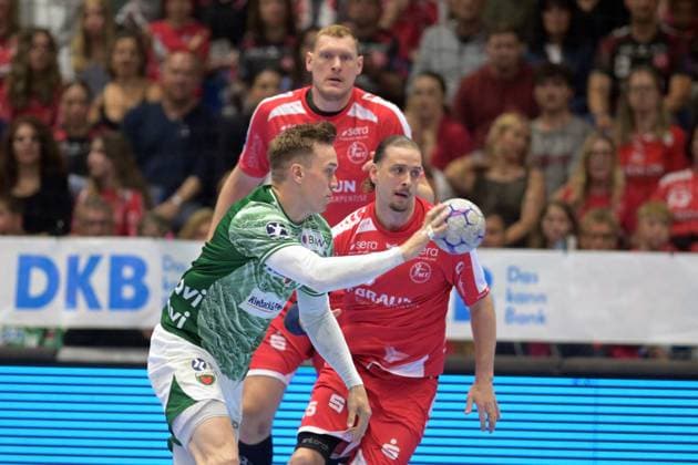 Lasse Bredekjaer Andersson Fuechse Berlin 11 on the ball , Olle Forsell Schefvert MT Melsungen 25 , Dainis Kristopans MT Melsungen 10 in the back , GER, MT Melsungen Fuechse Berlin, Handball, 1 Bundesliga, 33 Matchday, Season 2025 2026, 04 06 2026, GER, MT Melsungen Fuechse Berlin, Handball, 1 Bundesliga, 33 Matchday, Season 2025 2026, 04 06 2026 Kassel Copyright: xEibner-Pressefotox xRolandxSippelx EP_RSL
