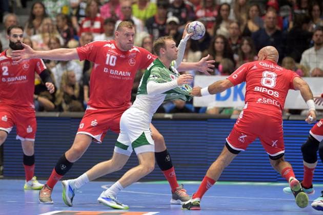 Mathias Gidsel Fuechse Berlin 19 on the ball , Dainis Kristopans MT Melsungen 10 , Adrian Sipos MT Melsungen 8 in defense , GER, MT Melsungen Fuechse Berlin, Handball, 1 Bundesliga, 33 Matchday, Season 2025 2026, 04 06 2026, GER, MT Melsungen Fuechse Berlin, Handball, 1 Bundesliga, 33 Matchday, Season 2025 2026, 04 06 2026 Kassel Copyright: xEibner-Pressefotox xRolandxSippelx EP_RSL