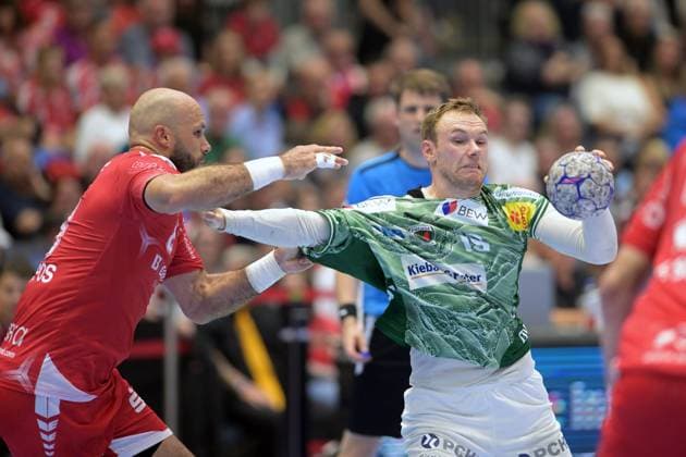 Mathias Gidsel Fuechse Berlin 19 on the ball and Adrian Sipos MT Melsungen 8 , GER, MT Melsungen Fuechse Berlin, Handball, 1 Bundesliga, Matchday 33, Season 2025 2026, 04 06 2026, GER, MT Melsungen Fuechse Berlin, Handball, 1 Bundesliga, Matchday 33, Season 2025 2026, 04 06 2026 Kassel Copyright: xEibner-Pressefotox xRolandxSippelx EP_RSL